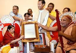 Iconic singer Lata Mangeshkar honoured with Swara Mauli award Legendary singer Lata Mangeshkar was recently honoured with "Swara Mauli" title by spiritual guru Vidya Narsimha Bharati Swami at her