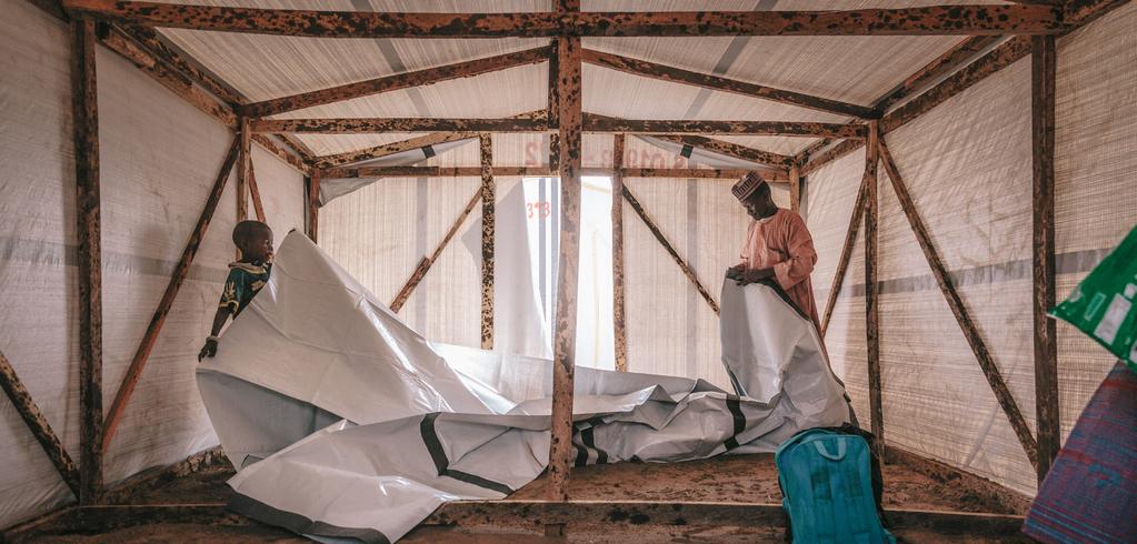IOM Shelter and Settlements 2016 Highlights June 2017 A temporary shelter being built in Maiduguri, Nigeria, M.