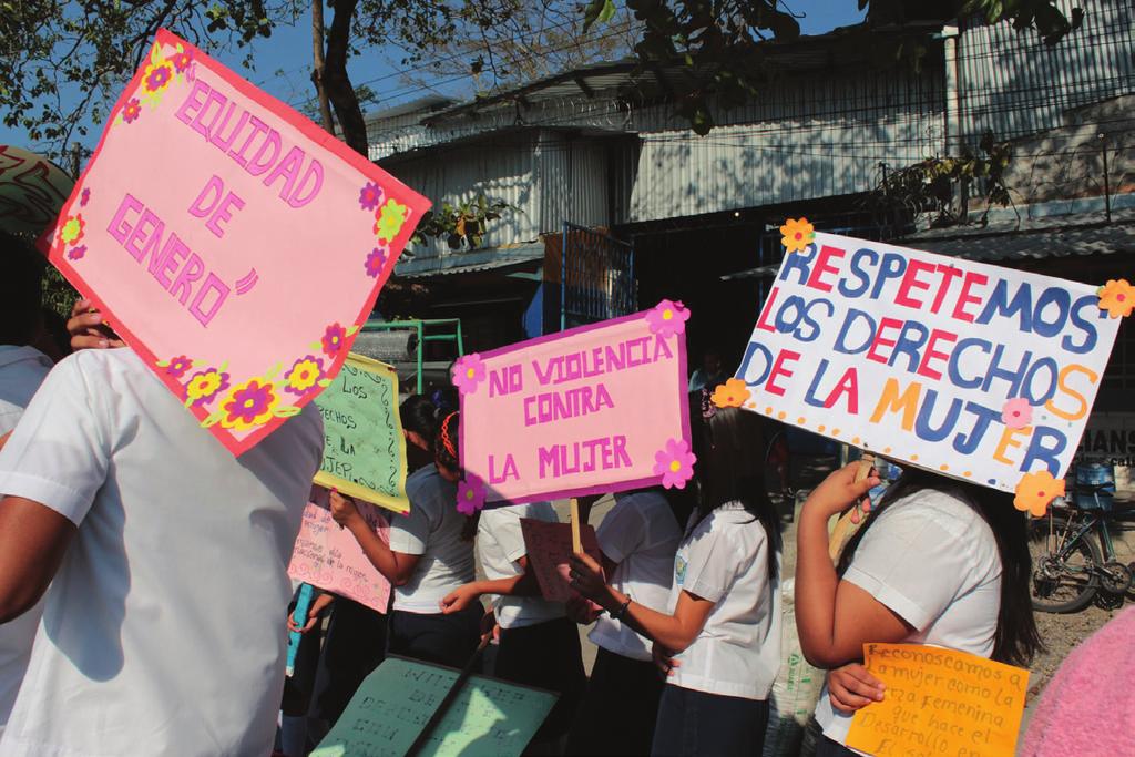 36 Between a Wall and a Dangerous Place SOURCE: ORMUSA FACEBOOK PAGE Students holding up signs in El Salvador. El Salvador In 2016, El Salvador reported 524 cases of femicides.
