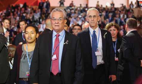 Selina Leem walks with Tony De Brum Foreign Minister of the Marshall Islands and Todd Stern, United States Special Envoy for Climate Change