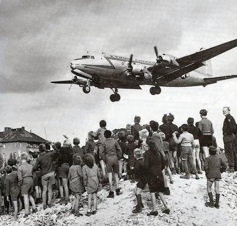 Berlin Airlift In 1948, Stalin closed the roads to West Berlin The US and Britain responded by flying food