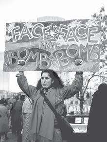 Name Date lass Directions: Photographs and paintings provide visual clues about events. Study this picture of a woman protesting government policies.