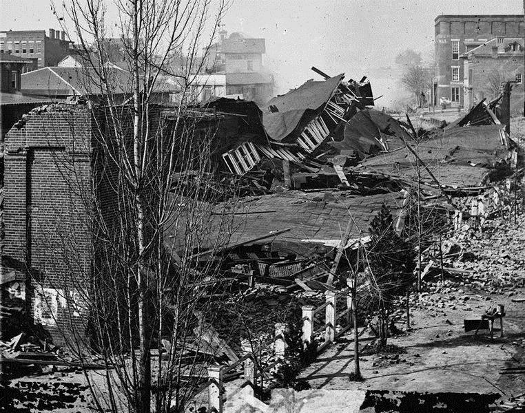 Georgia in 1865: Railroad Depot in Atlanta Image 7 Describe the damage in the photo.