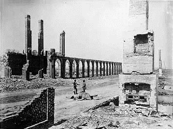 South Carolina in 1865: Railroad Depot in Charleston Image 8 Describe the damage in the photo.