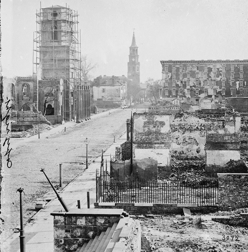 South Carolina in 1865: Main Street in Charleston Image 9 Describe the damage in the photo.