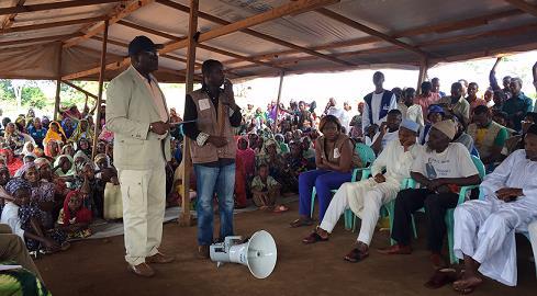Representative, Mr. Kouassi Lazare Etien, meets with refugees from the Central African Republic in Timangolo Camp, Cameroon.