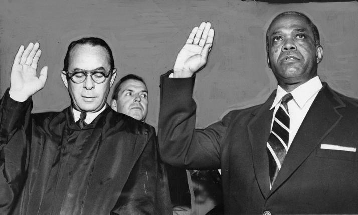 1955 First Negro Commissioner & Chairman George E.C. Hayes, Howard University Law School Professor, appointed PUC Commissioner by President Eisenhower, and sworn in by Municipal Court of Appeals Judge Nathan Clayton, June 1955.
