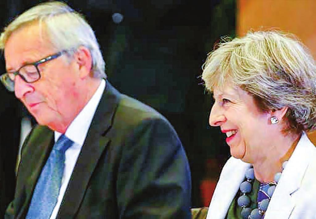 10 world 24 october 2017 World Briefs Military option must remain on the table with North Korea - UK s Johnson European Commission President Jean-Claude Juncker and British Prime Minister Theresa May