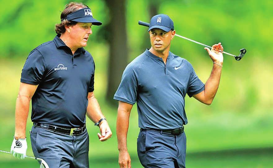 16 SPORT 24 Woods, Mickelson confirm $9 million duel in Las Vegas AUGUST 2018 LOS ANGELES Tiger Woods and Phil Mickelson will go headto-head in a winner-take-all $9 million (7.