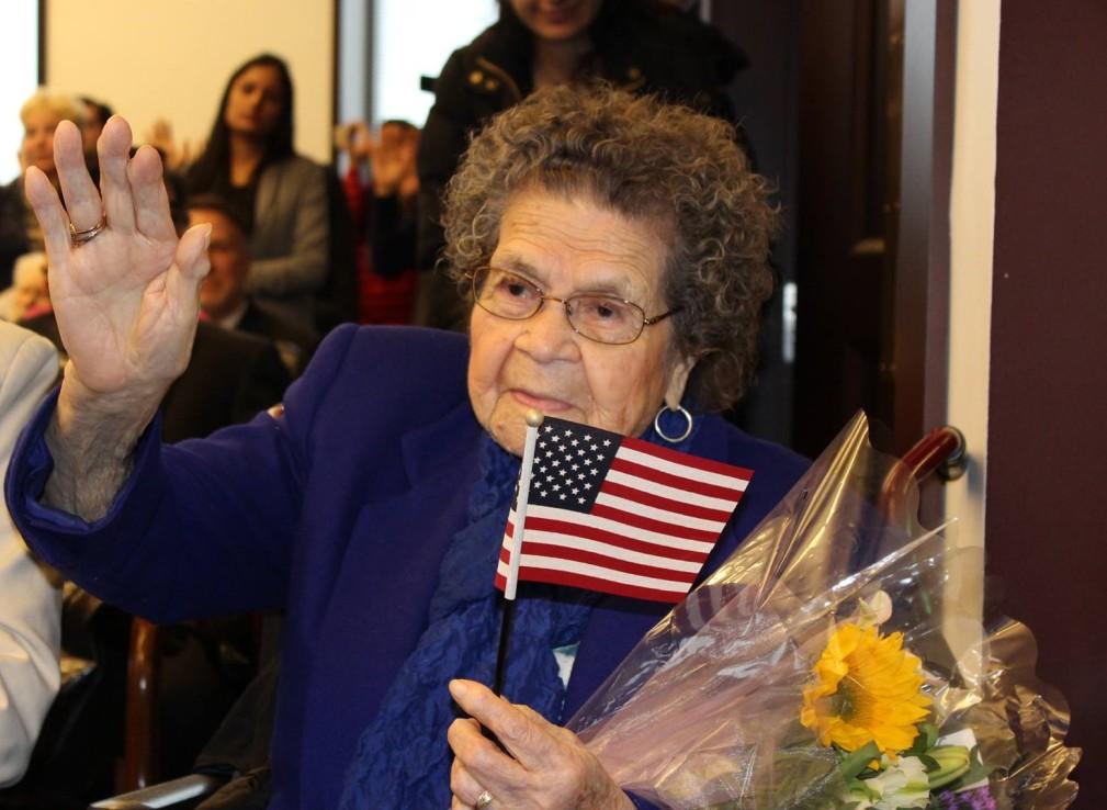 Page 4 Welcoming the Stranger 100 Year Old Becomes Naturalized U.S. Citizen 99 year old Maria Solis Perez was very determined to receive her citizenship papers before she turned 100 on February 2nd.