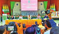 delivers a speech at the meeting with all levels of election sub-commissions chairmen and secretaries in Monywa, Sagaing Region, on 22 September.