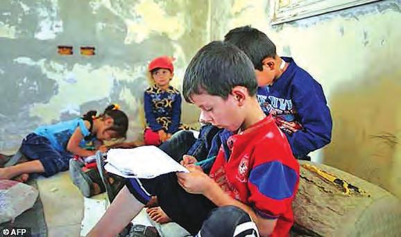 10 WORLD In abandoned villa, Syrian children study on the ground War-weary Mozambicans yearn to leave Malawi haven ALEPPO (Syria) In rebel-held northern Syria, displaced children sit or lie on the
