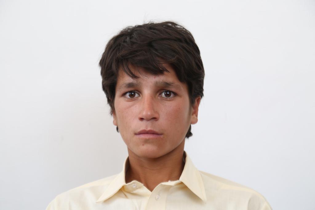 Abdul, 13 years old, at the IOM in Nimroz after his deportation from Iran. He is the only bread winner of his family.