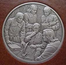 A coin depicting the signing of The