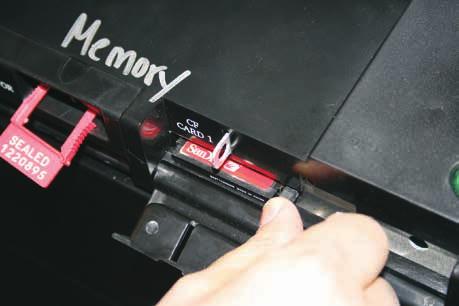 Remove the memory card: press the black button to