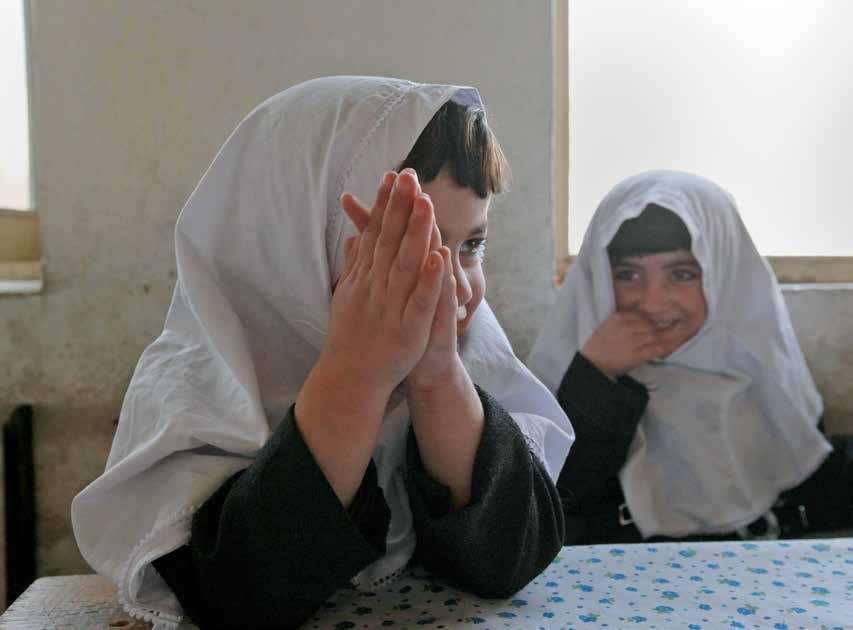 ABOVE: Afghan girls are shown taking part in a community-based
