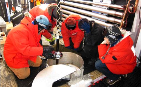 The webcast is at: http://icestories.exploratorium.edu/disp atches/index.php/. Graduate student Laura Gladstone at the South Pole Undergraduate students from UW performing DOM tests.