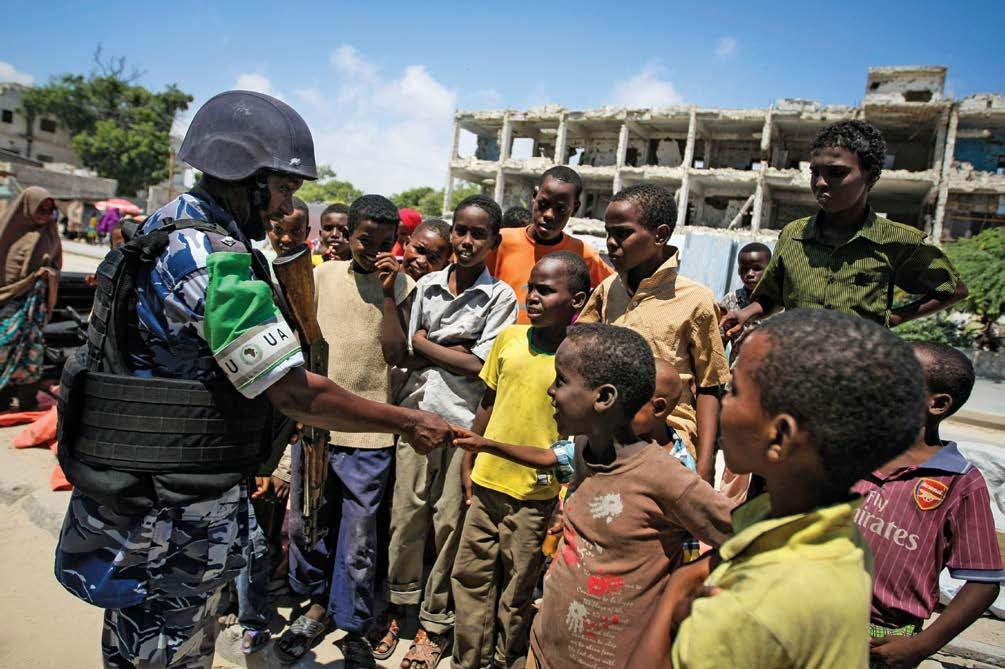 UN PHOTO/STUART PRICE The African Union Mission in Somalia s (AMISOM) police units work with their counterparts in the Somali national police to provide security to Mogadishu, in addition to training