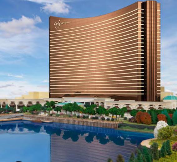 A rendering of the Encore Boston Harbor appears below, as does a photograph of the construction of the resort: