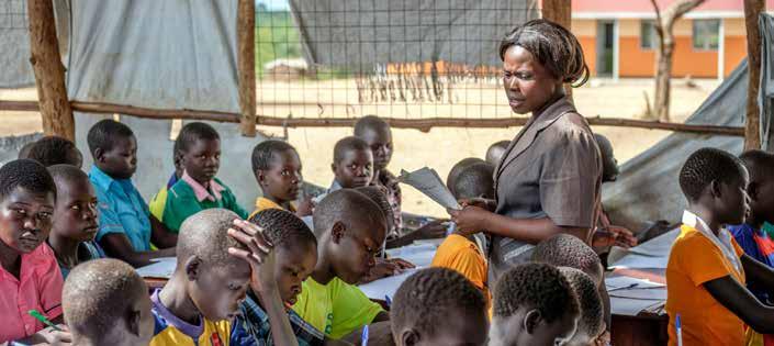MASS DISPLACEMENT, A DEFINING CHALLENGE OF OUR TIMES 8 A temporary elementary school in Bidibidi refugee settlement in Yumbe district in Northern Uganda, constructed from wood and plastic sheeting is