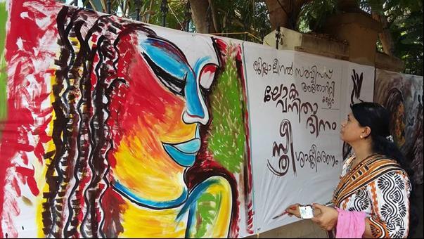 A CANVAS FOR AWARENESS AND CHANGE A splash of colours on a large canvas spreading beautiful messages about women empowerment the - District Legal Services Authority, Kannur made a passersby s day