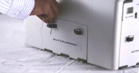 (b) Sealing of drop box of VVPAT with thread using Address Tag Thereafter, the lower part of the VVPAT unit, i.e. drop box, is sealed with the thread and Address Tag before actual poll starts.