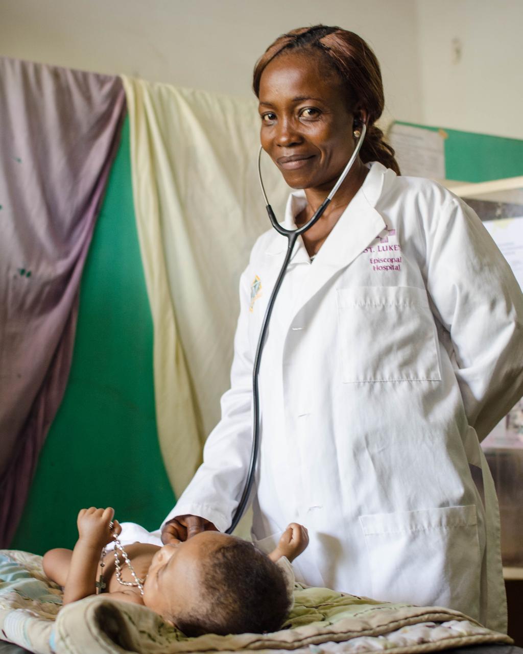 Equateur, DRC 2018 Mirielle Miguanga, a paediatrician from the Centre Hospitalier Universitaire de Mbandaka treats her sixmonth old patient, Narcis, with his mother Raphine by his side.