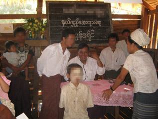 [Photos: KHRG] These photos, taken on February 11 th 2012, show Burma government members from Papun District when they came to introduce a hydroelectric power supply in C---  They arrived in C---
