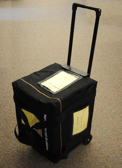 Voter Services Table supplies arrive in black rolling case (along with Check-in table