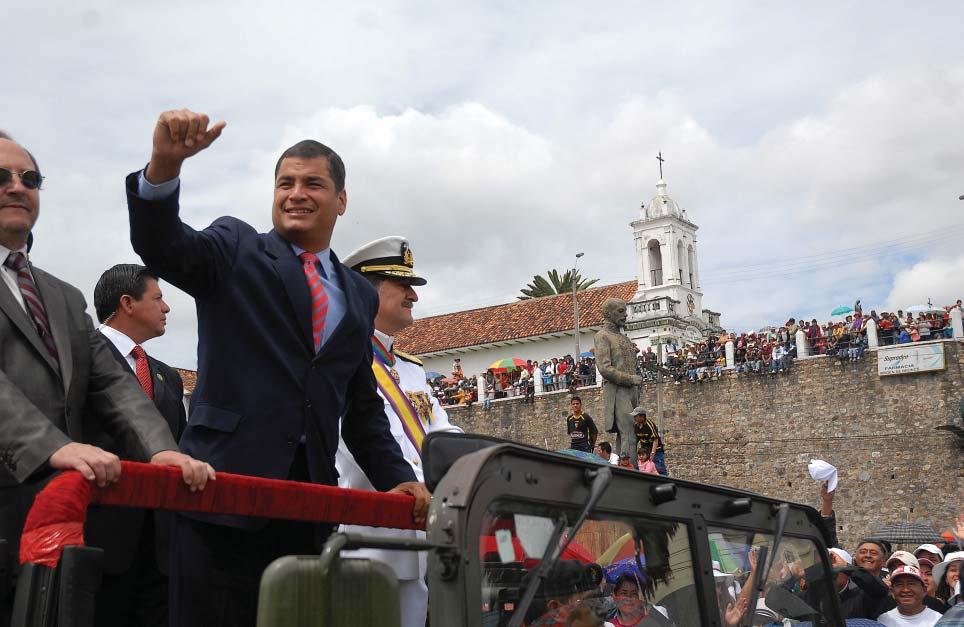 21 Photo courtesy of Presidencia de la República del Ecuador. President Correa waves to the crowd during an October military parade in Cuenca.