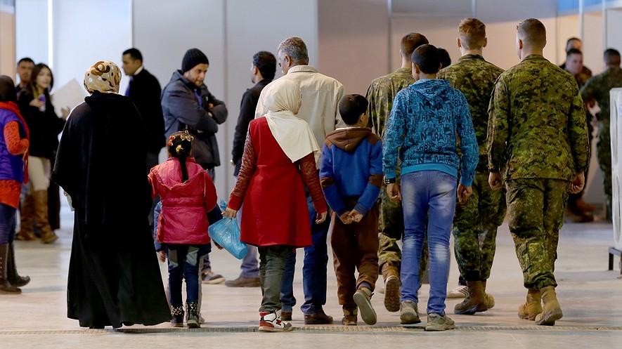 PRO/CON: Stopping Syrian refugees from coming to the U.S. By Tribune News Service, adapted by Newsela staff on 12.18.15 Word Count 1,747 Syrian refugees wait at Marka Airport in Amman, Jordan, on Dec.