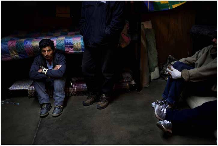 David Rochkind Migrants wait for lights out at a shelter in Nogales, Sonora. Many migrants depend on free shelters for a safe place to sleep on their way to the US or after having been deported.