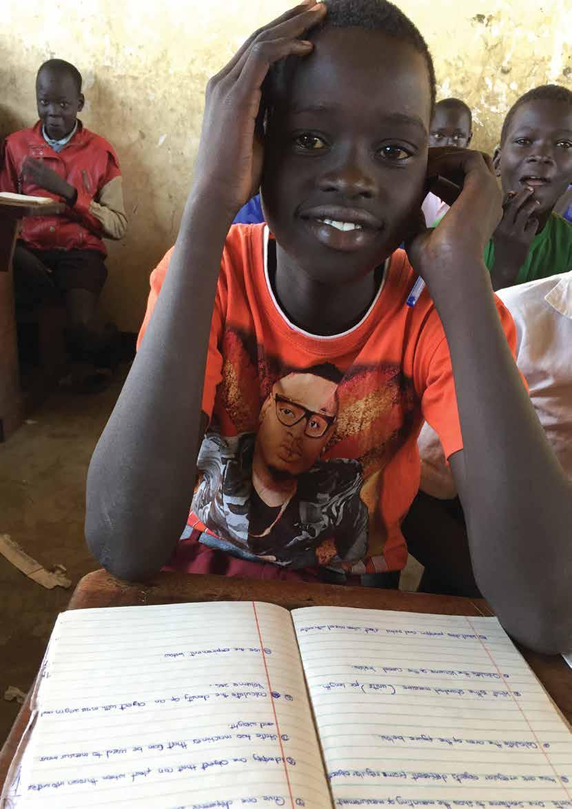 PART TWO: EDUCATION FOR EVERY LAST REFUGEE CHILD A refugee child from South Sudan studies at a school in Baratuku