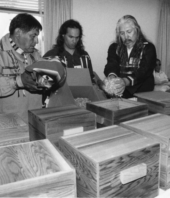 Southern Cheyenne leaders Moses Starr, Jr., Nathan Hart and Lucien Twins preparing human remains for the journey back to Oklahoma. Photo by Laurie Minor-Penland, courtesy of the Smithsonian Runner.