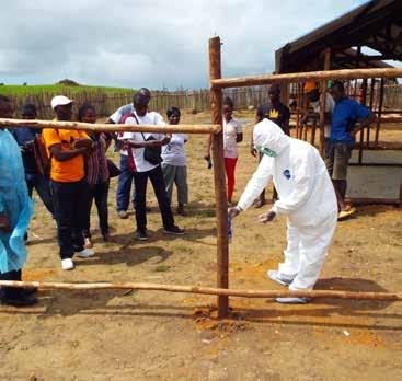 8 UNHCR Liberia 2014 in Review MTI trains health care staff on Ebola protocols, while the CCC is under construction.