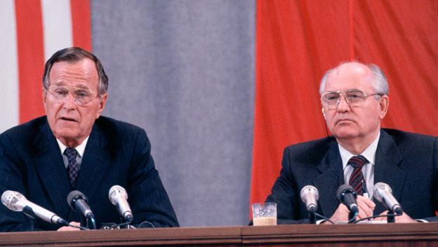 Bush and Gorbachev signed the START I agreement reducing the number of nuclear warheads to under 10,000