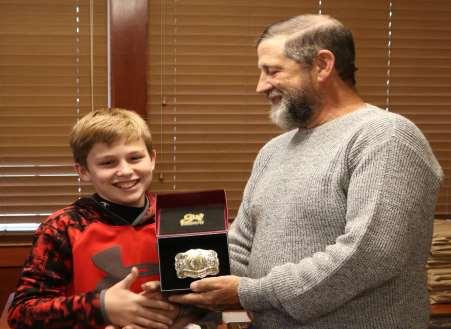 IAA Youth Shooter of the Year 2018 silver belt buckle presented to Aris Vogel by very proud grandpa,, Northern Board member. 2019 N.F.A.A. STATE DIRECTOR: Robert Rayhel 13984 E.