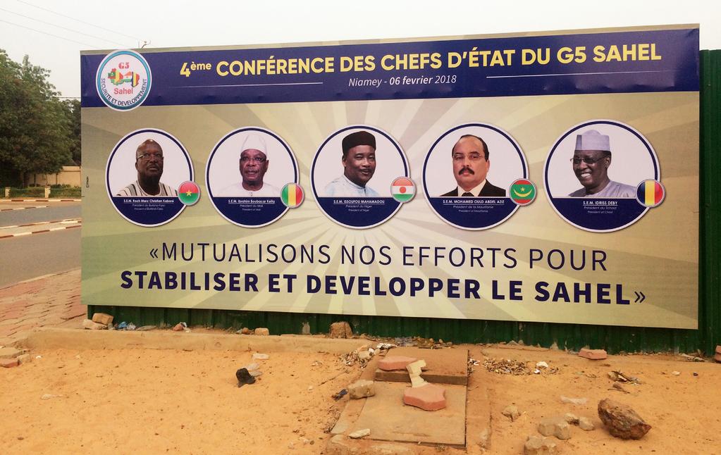 Photo credit: NigerTZai A billboard in Niger s capital Niamey, announcing a summit of Heads of State of the G5-Sahel in February 2018.