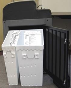 Due to numerous Ballot Cards scanned, the Scanner Bin of this machine is almost full as indicated by the counter.