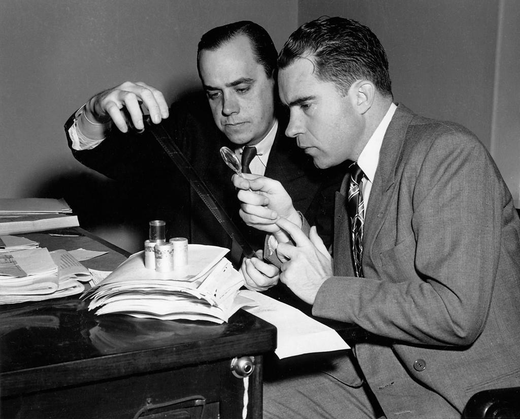 Richard Nixon (right) and the chief investigator for the House