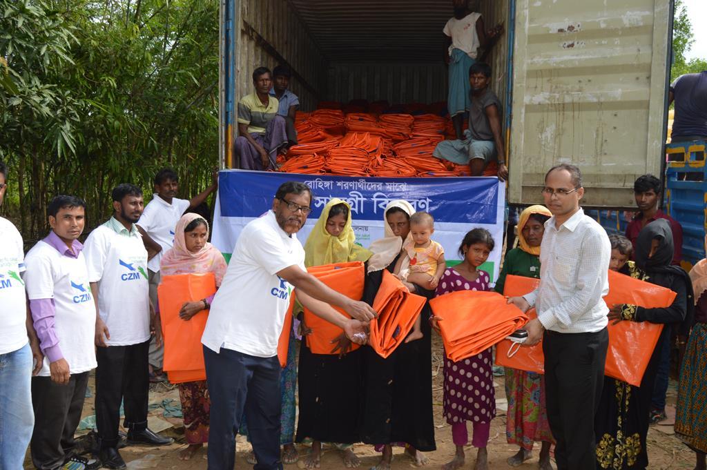 Ikhtiar Uddin Arafat, Magistrate was present during the distribution of synthetic tarpaulins The refugees took shelter in the open fields, roads and