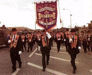 Portadown Orangemen march along the Catholic Garvaghy Road. Heavy security was provided by the army and the RUC.