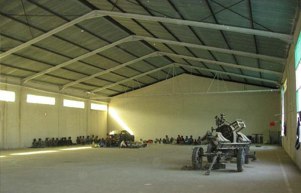 Around 134 people from Chad, Eritrea, Somalia, Sudan and other Sub-Saharan African countries detained in a metal hangar in Tripoli, September 2012.