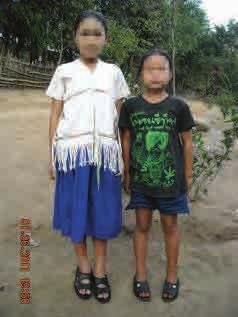 Uncertain Ground This photo, taken on January 26 th 2011 in Papun District shows Naw Htee K Pru Wah, 13 years old (left) and Naw Paw May Ra, 10 years old (right).