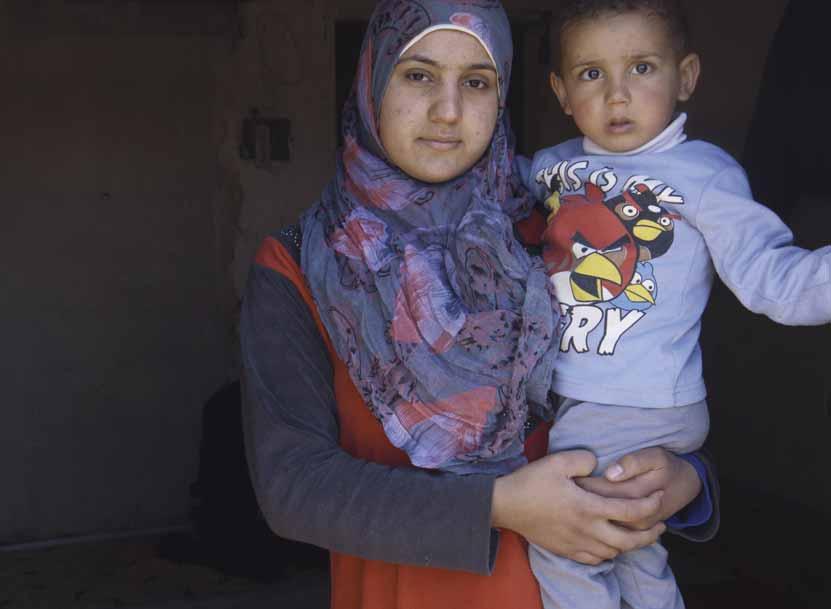 Bushra, the one millionth Syrian refugee to be registered, with her son in Tripoli, Lebanon (see http://www.unhcr.org/513623756.html). (21,300 claims).