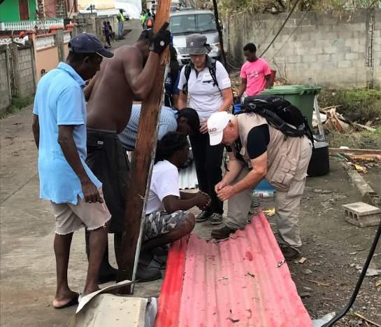 L $ 2, 2 7 2, 4 0 0 *All interventions proposed in this appeal are in line with the Dominica Flash Appeal DOMINICAN MAN REPAIRING THE ROOF OF HIS HOME DISCUSSION BETWEEN SHELTER EXPERTS AND COMMUNITY