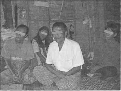 9 The Mon Forum (Issue No. 1/2005, January 31, 2005) II. Gross Human Rights Violations and Reason of Population Displacement Some villagers who fled from the southern part of Ye Township.