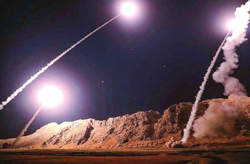 10 WORLD Iran fires missiles against terrorist camp in Syria TEHRAN Iran s Revolutionary Guards said on Monday they had launched a missile attack against a terrorist headquarters in Syria in