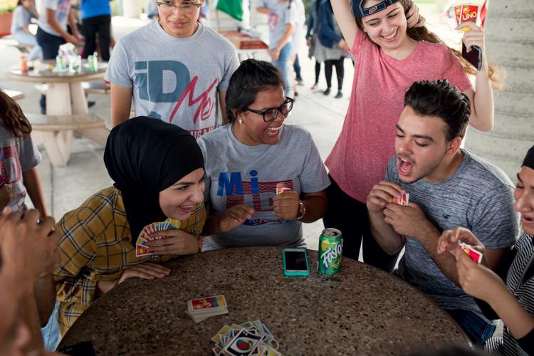 A region of opportunity: How Metro Detroit is helping its immigrant population succeed AARON MONDRY THURSDAY, AUGUST 25, 2016 An intense game of Uno at the Peaceful Picnic held at
