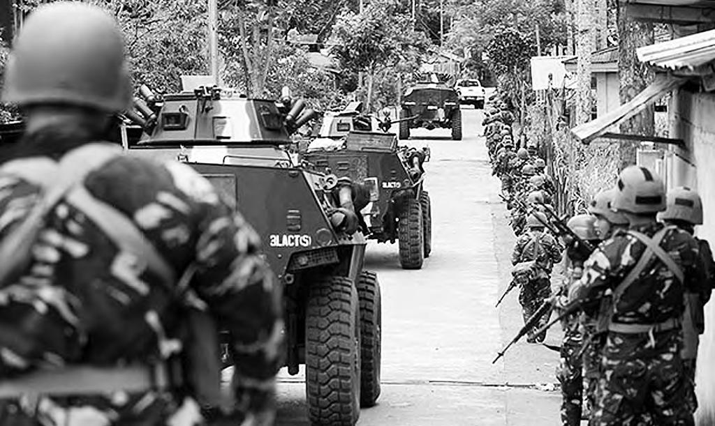 4 hawaii Filipino ChroniCle June 24, 2017 COVER STORY The Philippines Under the Specter of Martial Law By Edwin Quinabo he door of terror swung T wide opened in Marawi City.